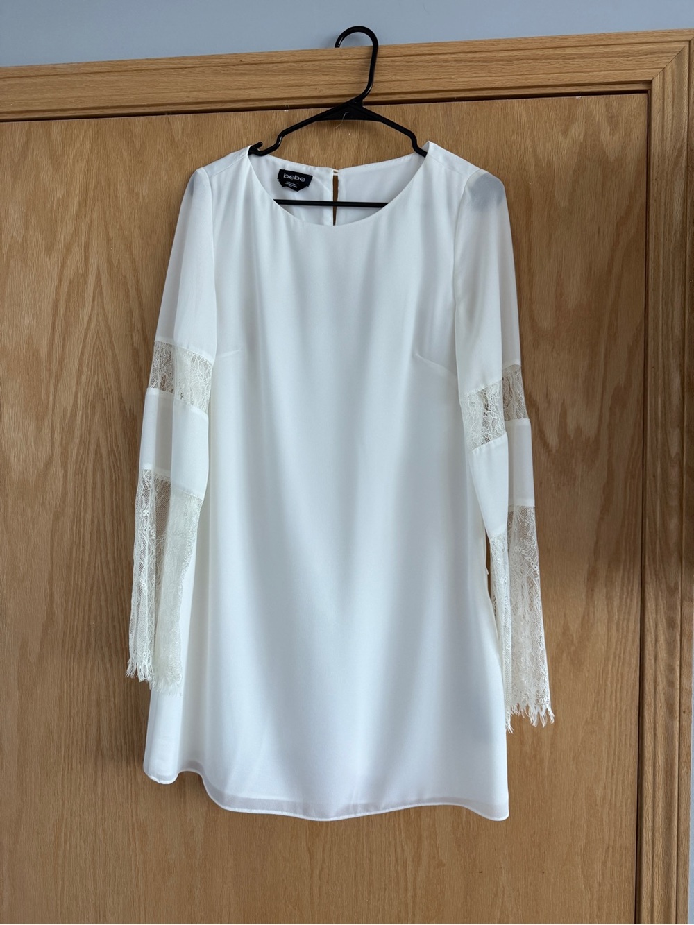 BEBE white flared sleeve dress